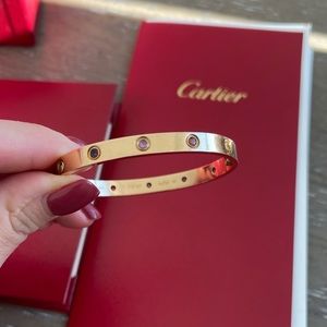Cartier Love bracelet crafted in 18k rose gold.